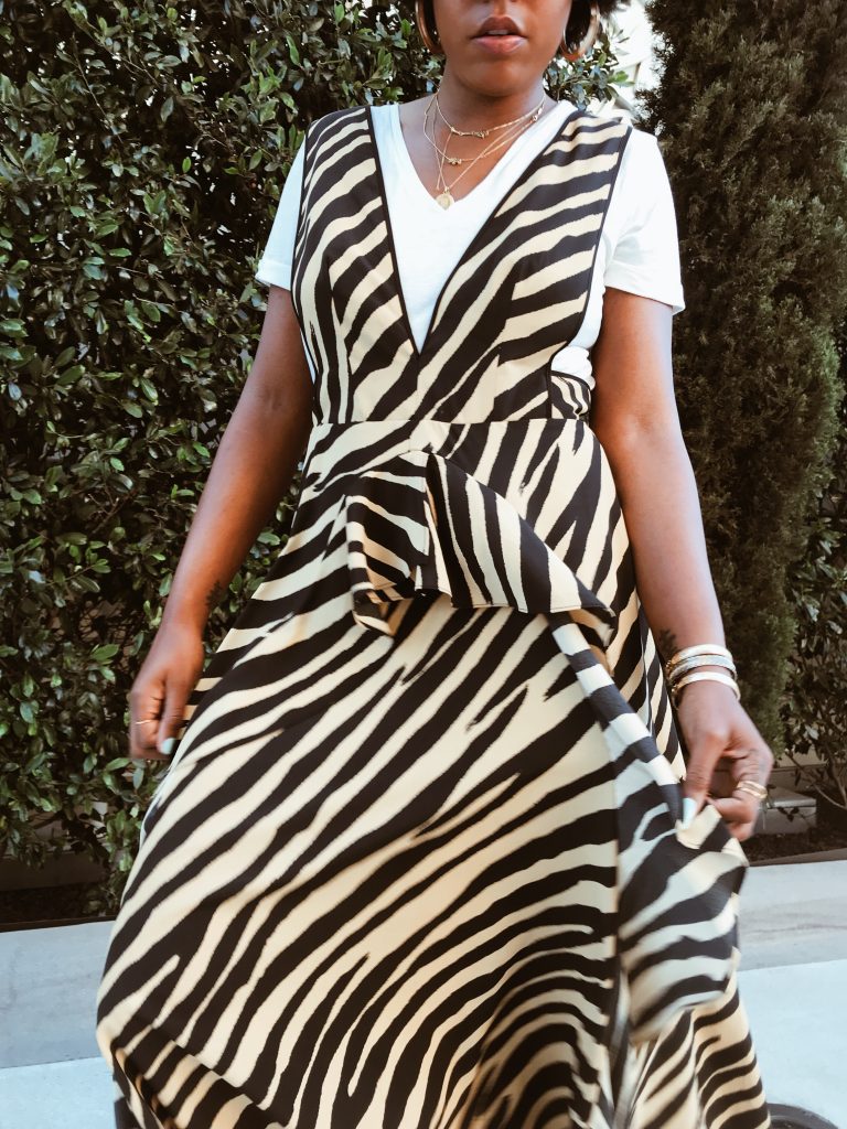Zebra print Topshop dress with plunging neckline deep v. Wear a dress over T-shirt with sneakers. Brooklyn blogger.